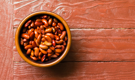 Red beans in a deep plate.の写真素材