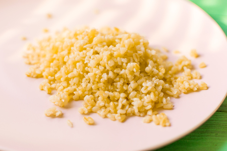 Cooked bulgur on a plate の写真素材