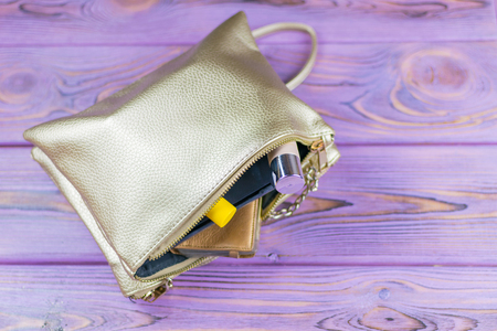 Confusion in the women's purse. Things do not get into the female clutch.の写真素材