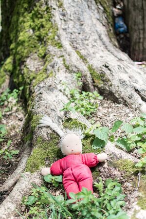 An old rag doll thrown.の写真素材
