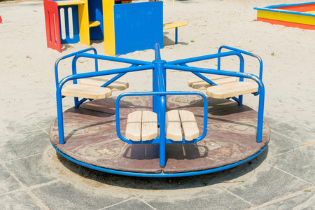 Children's round carousel on the site.の写真素材
