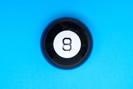Magic ball of predictions figure eight on a blue background.の写真素材