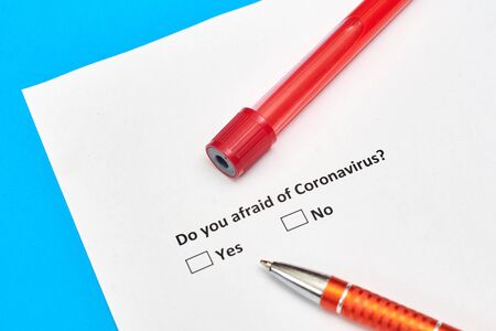 Do you afraid of coronavirus - a question on paper with options Yes and Noの写真素材
