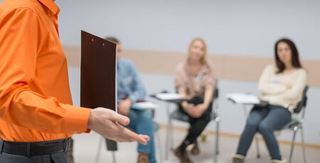 Lecturer conducts a lecture, training.