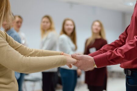 Women's hands in male hands.の写真素材