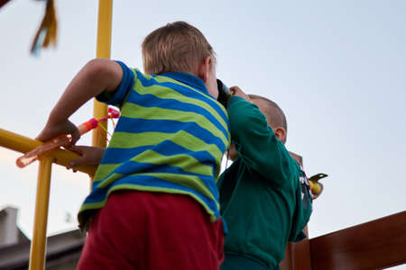 Gribovka, Odessa region - June 26, 2018: two boys met and played on vacation.のeditorial素材