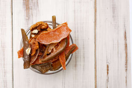 Various dried fruits on a saucepan. Pears, apples. Organic food.の写真素材