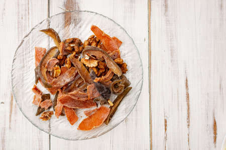Various dried fruits on a saucepan. Pears, apples. Organic food.の写真素材