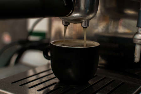 Preparing espresso in a coffee machine.の写真素材