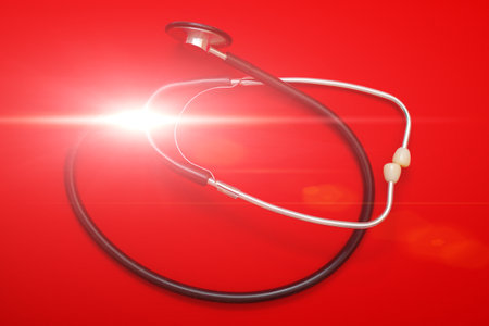 Stethoscope on a red background. Health care, medicine concept.の写真素材