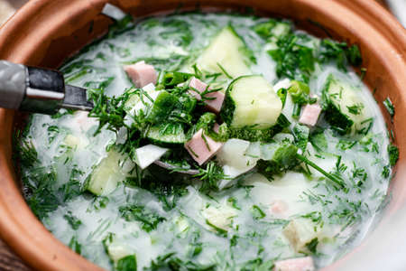 Okroshka, Russian cold soup on a wooden background.の写真素材