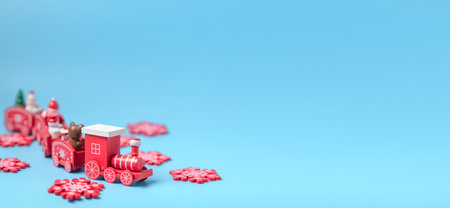 New Year's red train on a blue background. New Year, Christmas concept. Place for your text.の写真素材