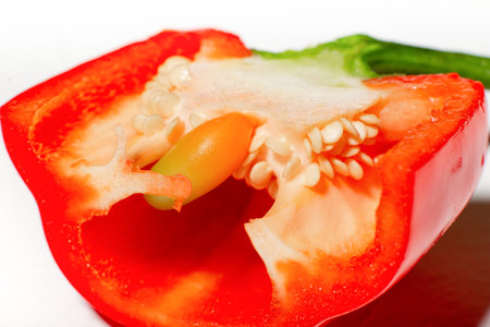 Red sweet pepper super macro. view inside. Bell pepper seeds close-up.の写真素材