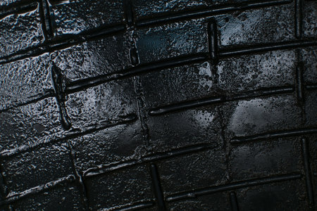 The texture of the rubber mat is wet and dirty.の写真素材