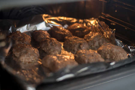 Roasting meat cutlets in the oven.の写真素材