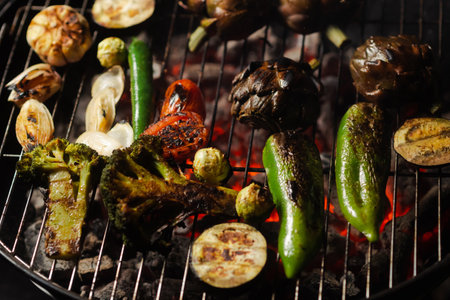 green grilling. Various vegetables - artichokes, peppers, eggplants are grilled. close-up. Healthy...