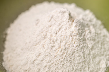 Flour sprinkled with close-up slide. Coarse flour is poured. preparation for cookingの写真素材