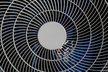Close-up of outdoor unit air conditioning grille. Abstract geometric figure