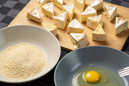 Making breaded Camembert cheeseの写真素材