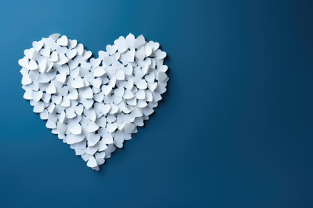 Capture the essence of romance with this captivating photo showcasing a heart layout against a calming blue setting, evoking a sense of unity and connectionの素材