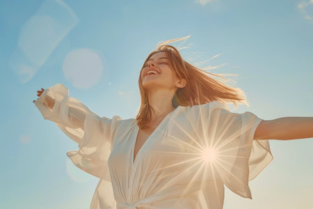 A woman in a white dress extends her arms upward, connecting with the limitless expanse above in a scene of liberation and transcendence.の素材