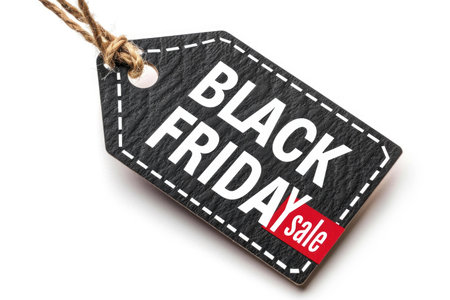 A black friday sale tag displayed on a white background, featuring a bold design and angled to the right.の素材