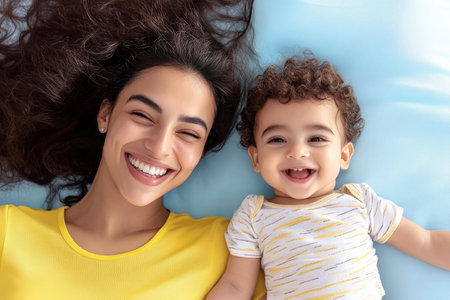 Cheerful Mother and Child Smiling Together - Happy Family Moment, Optimistic Style, Bonding Time.の素材