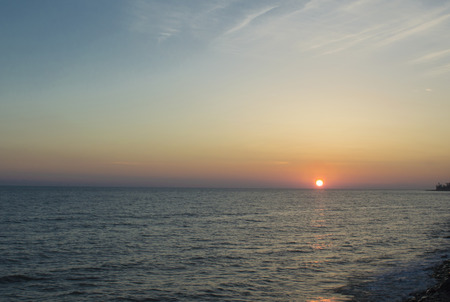 evening pink decline at the seaの写真素材