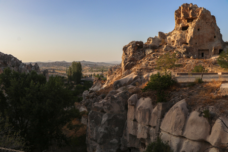 Ancient times people carved out homes in the fairy chimney rock formations in Cappadocia, Turkey. For it's unique geological formations, it's an popular travel destination in Turkey.Ancient times people carved out homes in the fairy chimney rock formations in Cappadocia, Turkey. For it's unique geological formations, it's an popular travel destination in Turkey.の写真素材