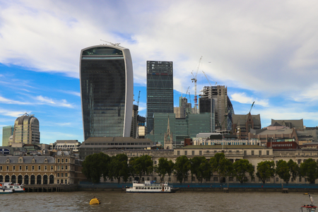 London, United Kingdom - August 28, 2017: Modern architectural buildings and panoramic aerial view of urban London against a cloudy sky.のeditorial素材