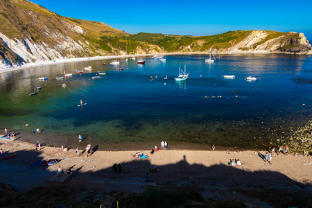 Dorset, United Kingdom- July 14, 2018: Lulworth Cove is a cove near the village of West Lulworth, on the Jurassic Coast in Dorset, southern England.のeditorial素材