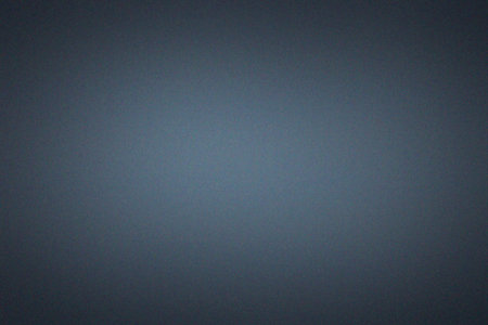 Dark blue grainy noisy background with some smooth lines in it and a gradientの素材