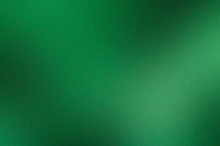 Green grainy gradient background with some smooth shades and highlights in it, green gradientの素材
