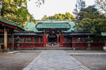 Person praying at Nezu Shrine in Tokyoのeditorial素材