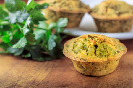 Vegan muffins made with spinach, cornflour and sesame, flax and sunflower seedの写真素材