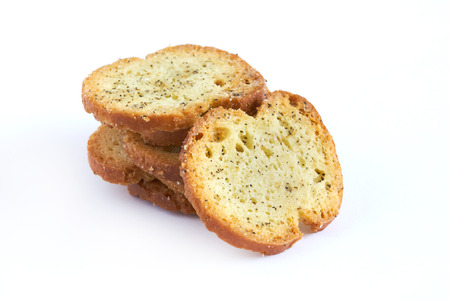 Round rusks with spices isolated on white backgroundの写真素材