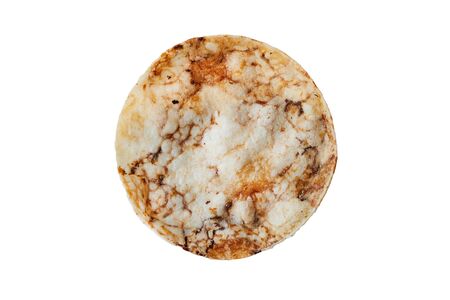 Brown rice chips isolated on white background. Healthy crispy snackの写真素材