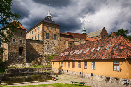 Oslo, Norway - July 18, 2016: Exterior of Akershus Fortress in Oslo, Norway. Akershus Fortress (Norwegian: Akershus Festning) or Akershus Castle (Norwegian: Akershus slott) is a medieval castle that was built to protect Oslo, the capital of Norway. It hasのeditorial素材