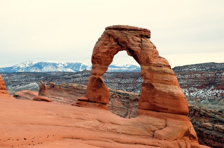 Closeup of Delicate Arch at Arches national park with La Sal mountains in the background