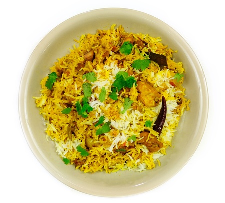 Delicious Chicken Biriyani - an exotic traditional Indian cuisine served with cilantro and herbsの写真素材