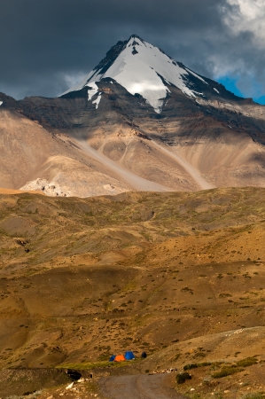 Camping at the base of Himalayan mountains in summer の写真素材