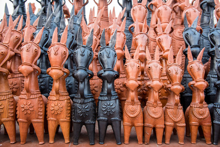 Clay horses in black and red from Bankura in West Bengalの写真素材