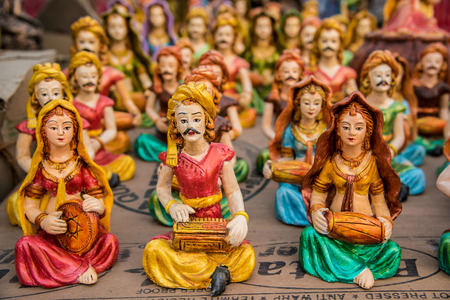 Beautiful clay dolls of miniature musicians performing in a band of classical musicの写真素材