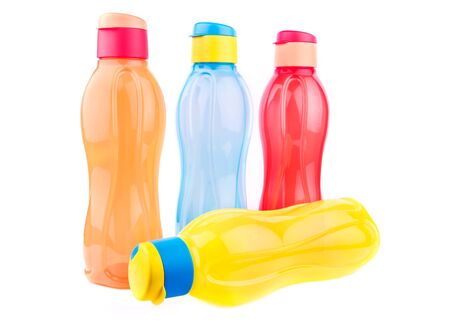 Colorful fridge pet bottles isolated over white backgroundの写真素材