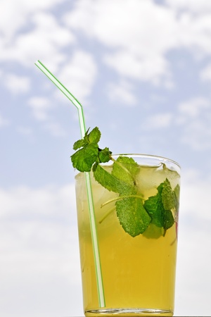 mojito cocktail with sky backgroundの写真素材