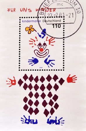 GERMANY - CIRCA 2000: A stamp printed in Germany shows drawing a clown, circa 2000 の写真素材