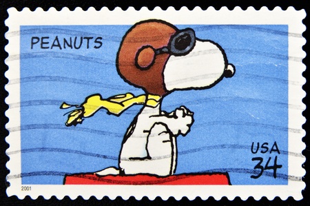 UNITED STATES OF AMERICA - CIRCA 2001: A stamp printed in the United States of America shows image celebrating the cartoon character "Peanuts", circa 2001 のeditorial素材