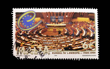 MALTA - CIRCA 1999: A stamp printed in Malta showing the interior of the European Parliament, circa 1999 の写真素材