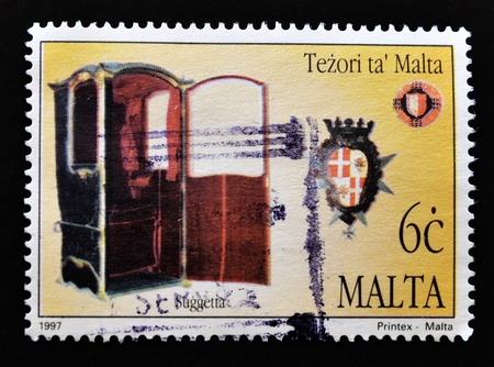 MALTA - CIRCA 1997: A stamp printed in Malta shows confessional, circa 1997 の写真素材