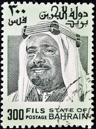 BAHRAIN - CIRCA 1976: A stamp printed in Bahrain shows amir Isa ibn Salman al-Khalifa, circa 1976のeditorial素材